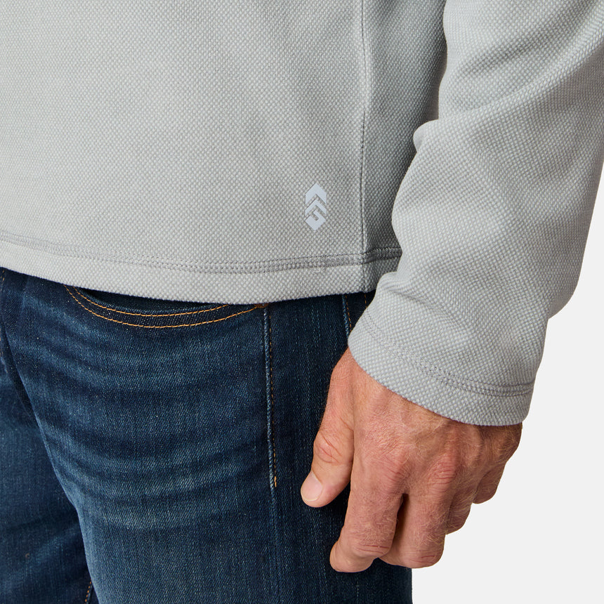 [Kolby is 6'2" wearing size M.] Free Country men’s light gray hooded long-sleeve shirt with subtle textured fabric—styled with dark blue jeans for a casual, comfort-forward look.