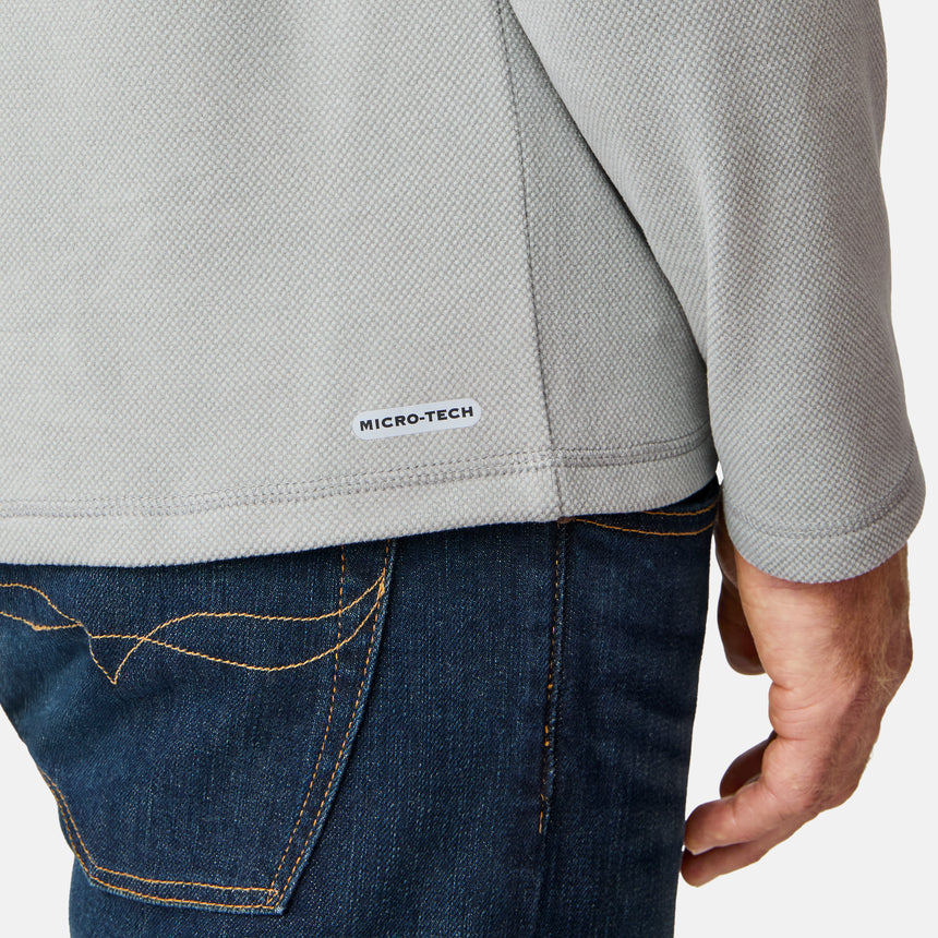 [Kolby is 6'2" wearing size M.] Free Country men’s light gray hooded long-sleeve shirt with subtle textured fabric—styled with dark blue jeans for a casual, comfort-forward look.