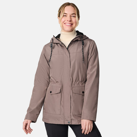 [CJ is 5'10" wearing size S.] Women’s light brown hooded jacket with zip-front closure, flap pockets with button accents, and adjustable hood drawstrings—layered over a light turtleneck sweater and paired with black pants for a cozy, cold-weather look.