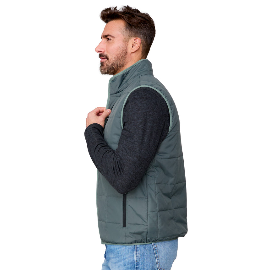 [Justin is 6'1" wearing size M.] Man wearing a green puffer vest over a black long-sleeve shirt on a white background