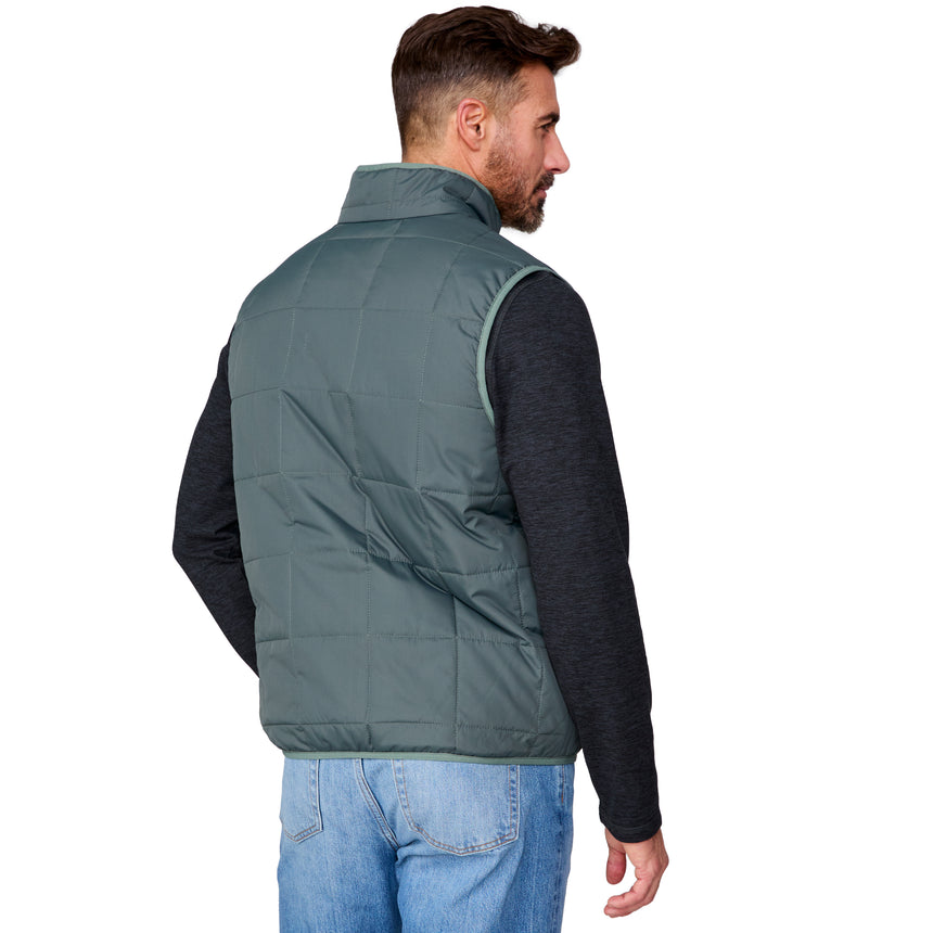 [Justin is 6'1" wearing size M.] Man wearing a green puffer vest on a white background