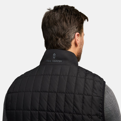 Back of the black quilted puffer vest with a neck logo and Free Country branding on the collar