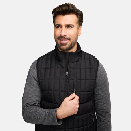 Close up of man in black quilted Sperrin vest with zipper detail