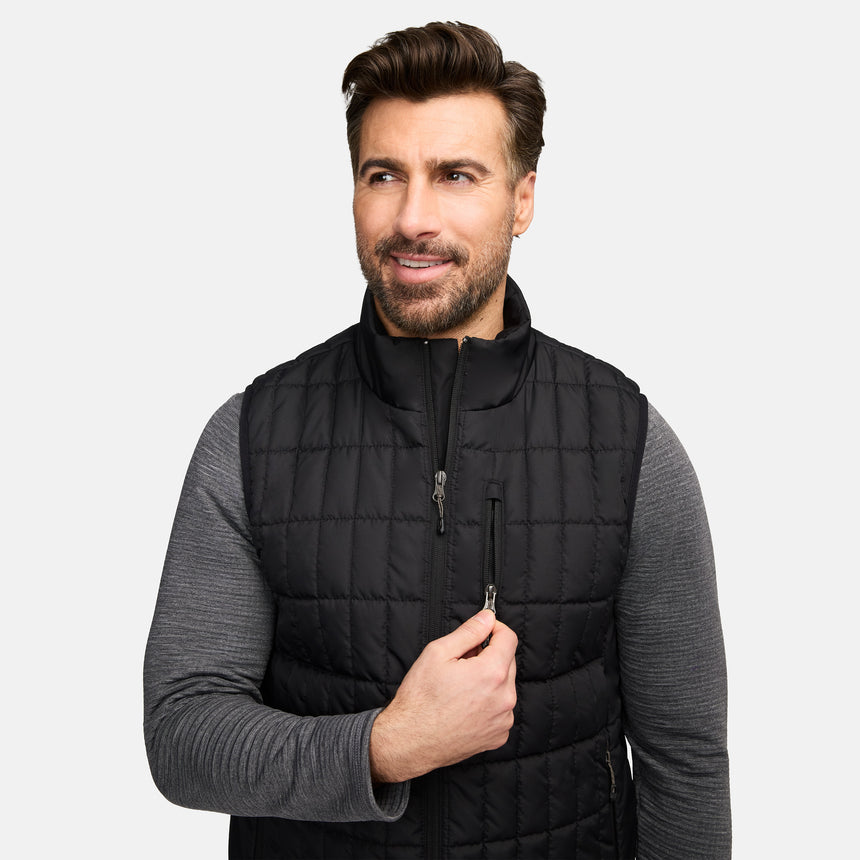 Close up of man in black quilted Sperrin vest with zipper detail