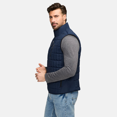 Side profile of man wearing navy quilted vest with high collar and zipped front.