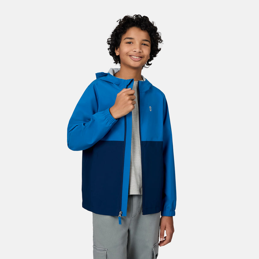 [Emporer is wearing size 10/12] Child wearing a blue and navy jacket on a white background