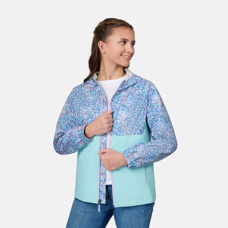 [Kai is wearing size 10-12 M] Child wearing a floral-patterned jacket with a light blue bottom half on a white background