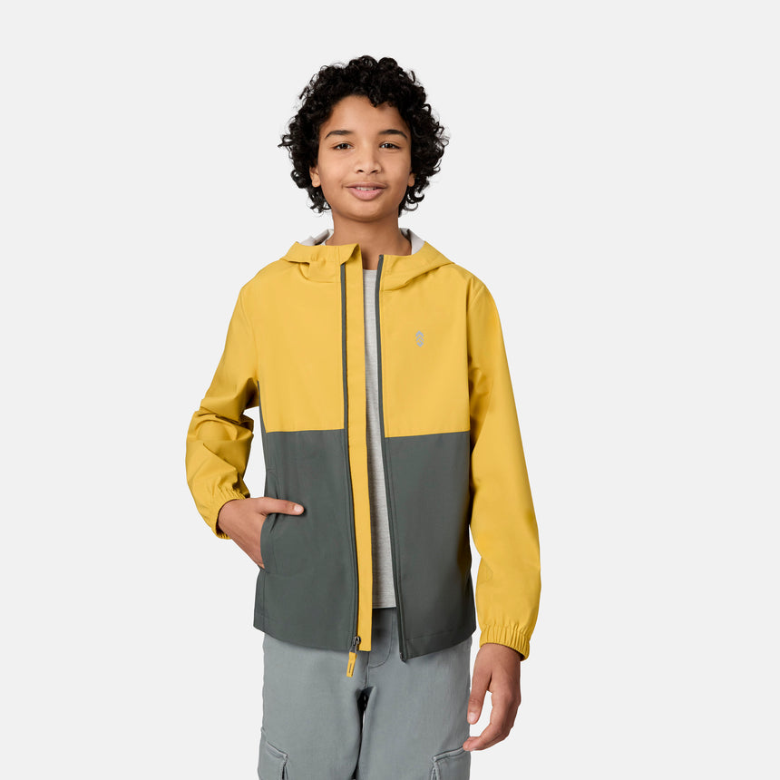 [Emporer is wearing size 10/12] Child wearing a two-tone yellow and gray jacket on a white background