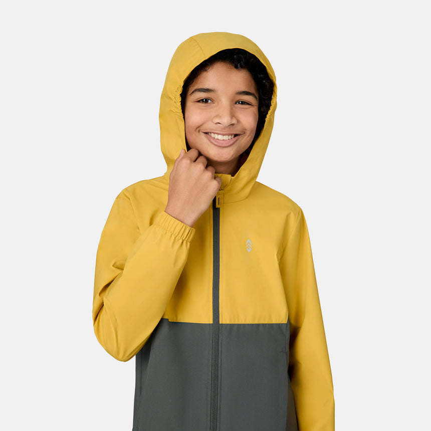 [Emporer is wearing size 10/12] Child wearing a two-tone yellow and gray jacket on a white background