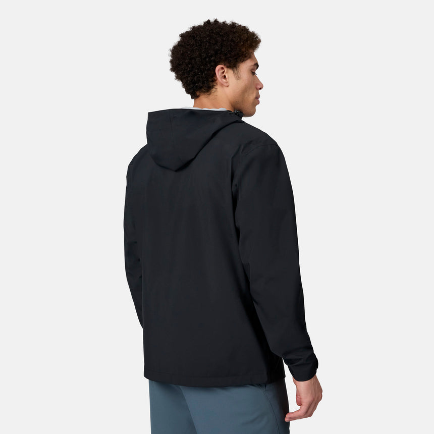 [Ikce is 6’1" wearing size M] Person wearing a black rain jacket on a white background