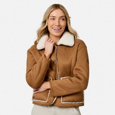 Brown faux suede shearling reversible jacket with white sherpa trim worn by model
