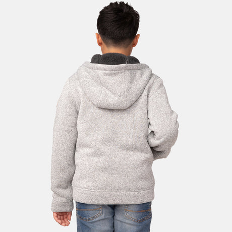 [Model is wearing a size Medium.] Boy wearing the Free Country Boys' Mountain Fleece Hoodie Jacket in light grey heather, featuring a light grey zipper and small round logo on the sleeve.