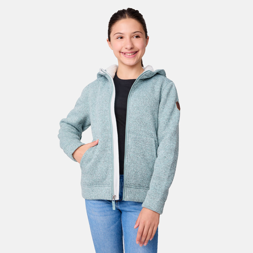 [Samantha is wearing size M.] Girls' light green fleece hoodie with sleeve patch and front pockets — relaxed fit for casual layering