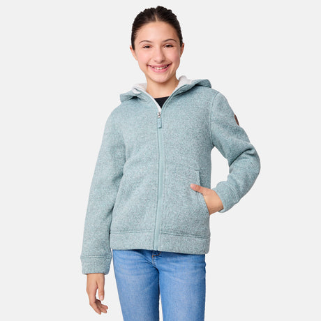 [Samantha is wearing size M.] Girls' light green fleece hoodie with sleeve patch and front pockets — relaxed fit for casual layering