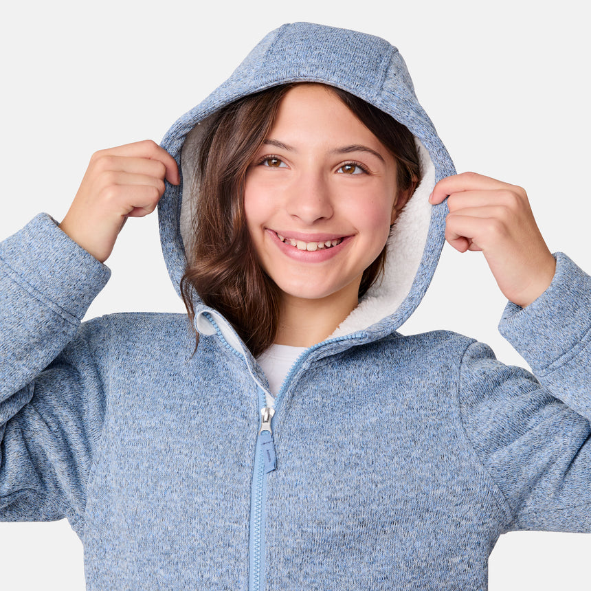 [Samantha is wearing size M.] Girls' light blue zip-up hoodie with white lining and front pockets — soft, casual layer for cool-weather comfort