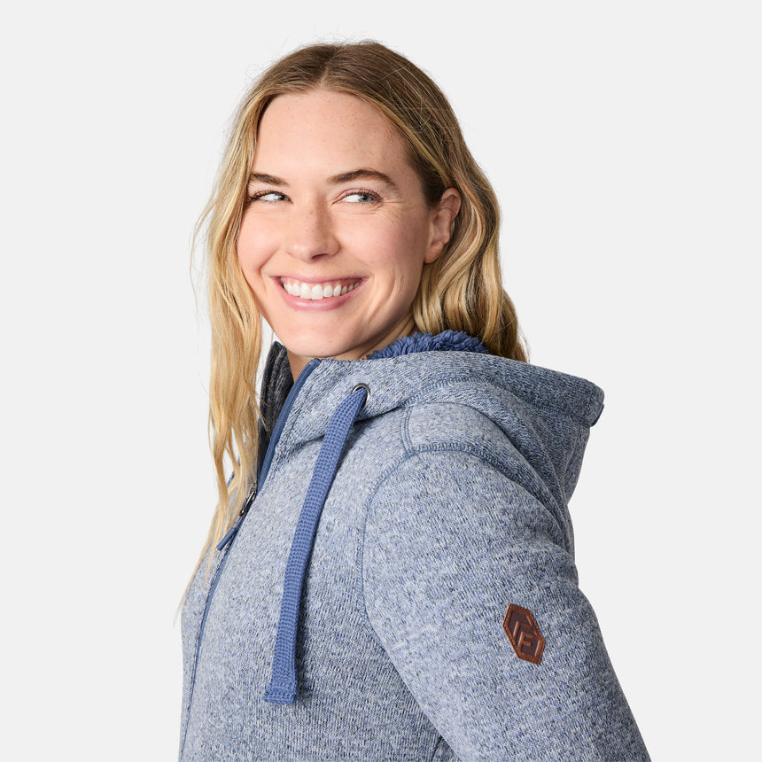 [CJ is 5'10" wearing size S.] Woman wearing a blue hoodie on a white background