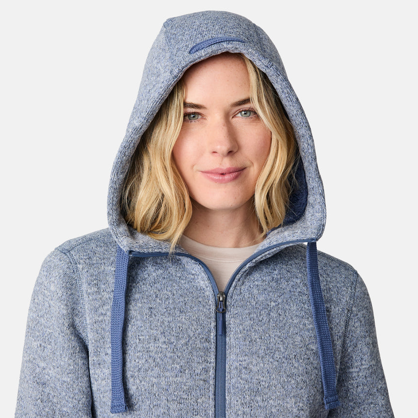 [CJ is 5'10" wearing size S.] Woman wearing a blue hoodie on a white background