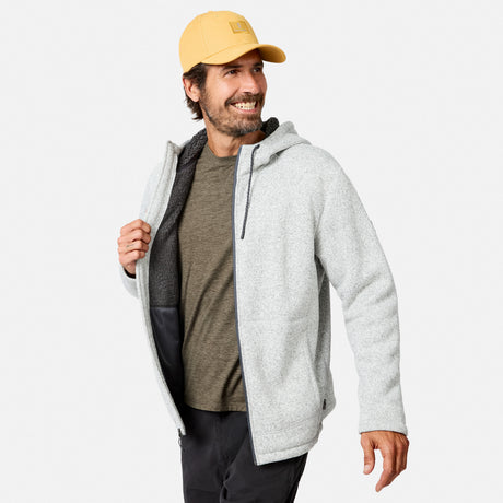 [Model is wearing size M.] A man wearing the Free Country Men’s Mountain Fleece Jacket smiles while looking to the side against a plain white background.