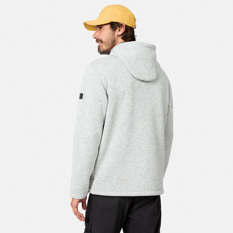 [Model is wearing size M.] A man wearing the Free Country Men’s Mountain Fleece Jacket in light gray and a yellow cap stands with his back to the camera against a plain white background.