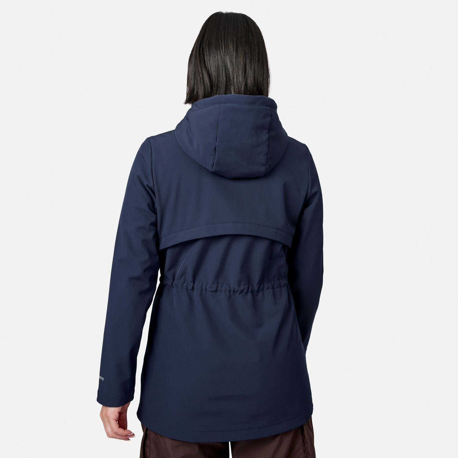 [Model is wearing size S.] A woman viewed from the back wearing a dark navy hooded jacket with a drawstring waist, against a light gray studio background.