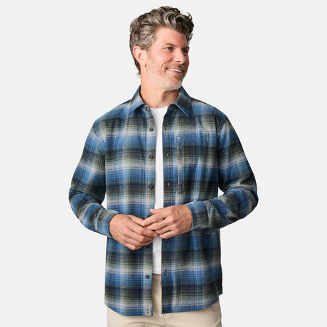 [Kolby is 6'2" wearing size M.] Men’s long-sleeve plaid button-up shirt in blue, black, and white — soft flannel texture with checkered design and casual fit