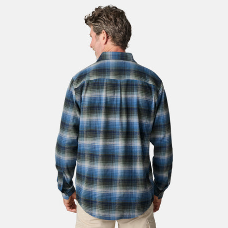 [Kolby is 6'2" wearing size M.] Men’s long-sleeve plaid button-up shirt in blue, black, and white — soft flannel texture with checkered design and casual fit