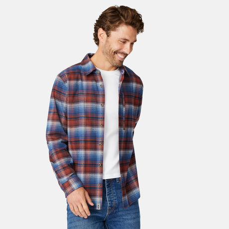 [Matt is 6'2" wearing size M.] Men’s long-sleeve plaid button-up shirt in red, blue, and white — casual fit with front buttons and chest detailing