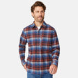 [Matt is 6'2" wearing size M.] Men’s long-sleeve plaid button-up shirt in red, blue, and white — casual fit with front buttons and chest detailing