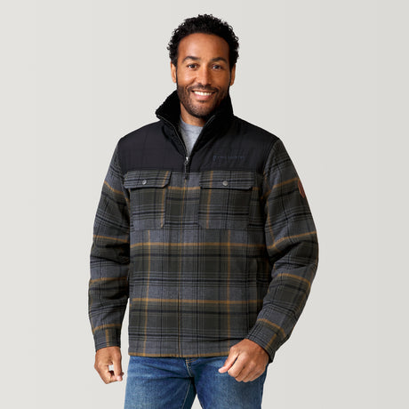 [Jonathan is 6’1” wearing a size Medium.] Man wearing Free Country Men's Woodsman Work Jacket in green and grey plaid with a full front zipper opening, soft lining, and recycled polyester filling, light grey background. Perfect men’s jacket for fall weather.