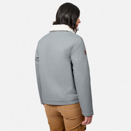[Model is wearing size S.] A man shown from the back wearing a light gray jacket with a white shearling-style collar and tan pants, photographed against a plain light gray studio background.