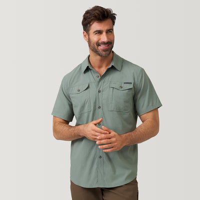 [Justin is 6'1" and wearing a size M] Men's Expedition Nylon Rip-Stop Short Sleeve Shirt - M - Dried Sage #color_dried-sage