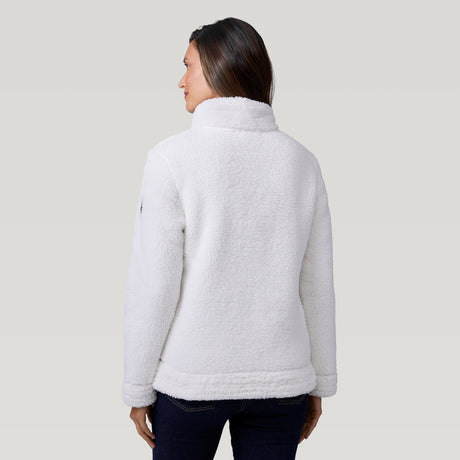 [Model is wearing a size Small.] Woman wearing a Free Country white winter jacket standing against a plain light gray background.