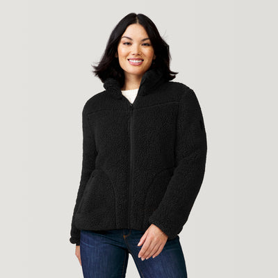 [Megan is 5’6” wearing a size Small.] Women's Summit Sierra Sherpa Butter Pile® Jacket - Black - S #color_black