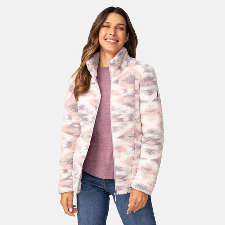 [Olga is 5'9" wearing a size Small.] Woman wearing a Free Country pink-and-gray patterned winter jacket, styled with a purple shirt and blue jeans, standing against a plain light gray background.