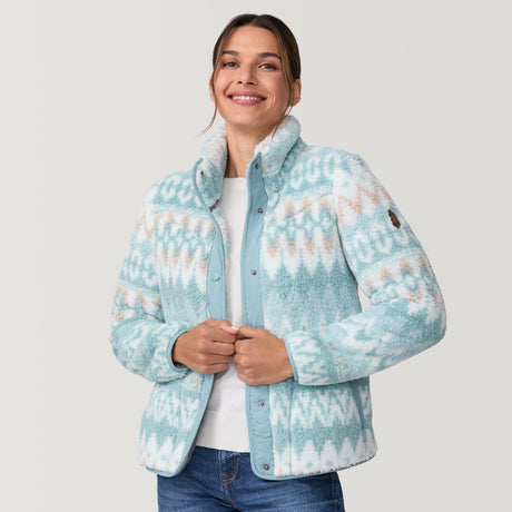 [Olga is 5'9" wearing size S.] Woman wearing a light blue patterned fleece jacket on a plain background
