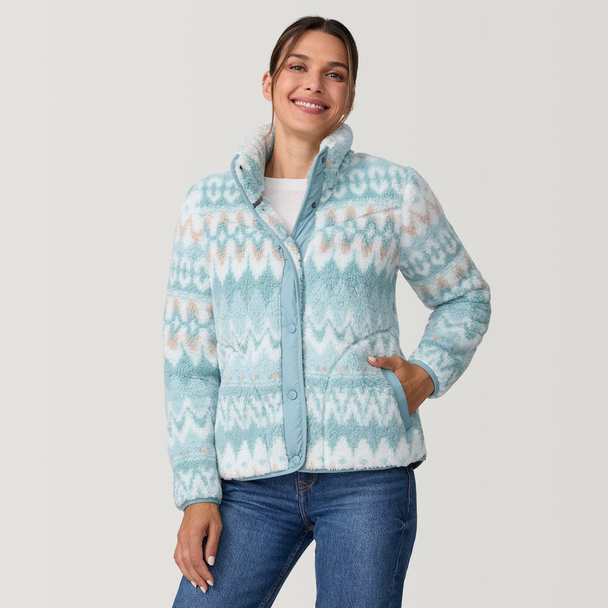 [Olga is 5'9" wearing size S.] Woman wearing a light blue patterned fleece jacket on a plain background