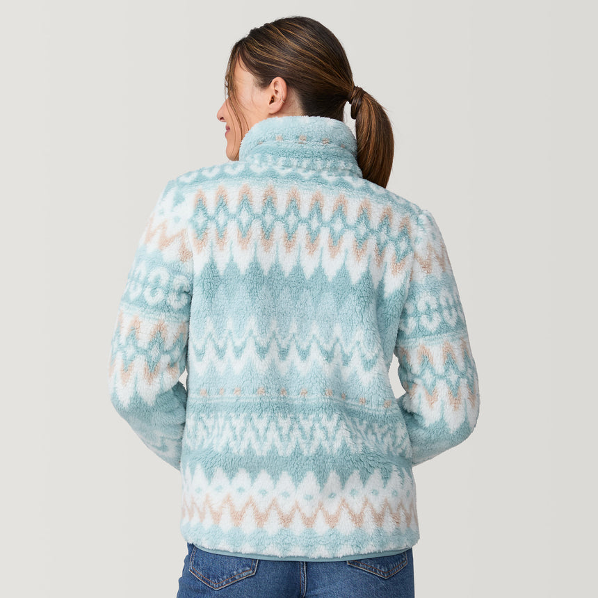 [Olga is 5'9" wearing size S.] Woman wearing a light blue patterned fleece jacket on a plain background