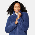 Woman wearing a blue fleece jacket on a white background