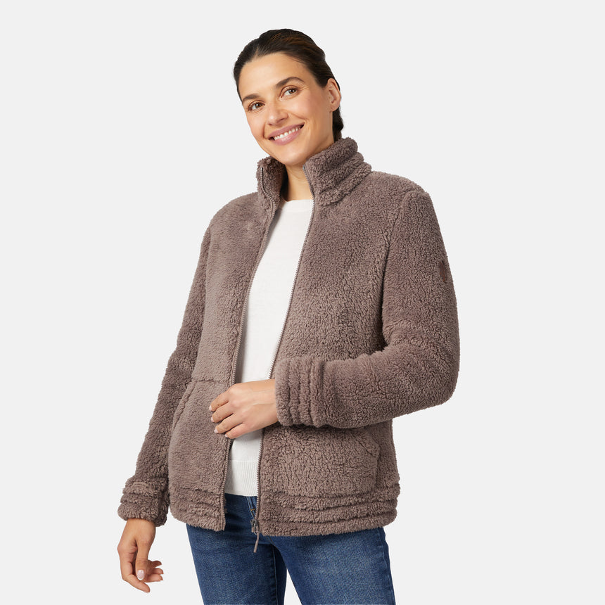 Woman wearing a brown fleece jacket on a white background