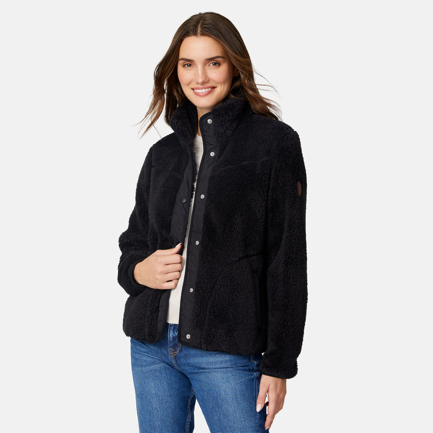 [Jessica is 5'9.5" wearing size S.] Woman wearing a black fleece button front jacket on a white background