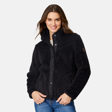 [Jessica is 5'9.5" wearing size S.] Woman wearing a black fleece button front jacket on a white background
