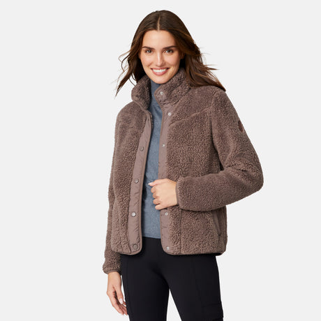 [Jessica is 5'9.5" wearing size S.] Woman wearing a brown fleece button front jacket on a white background