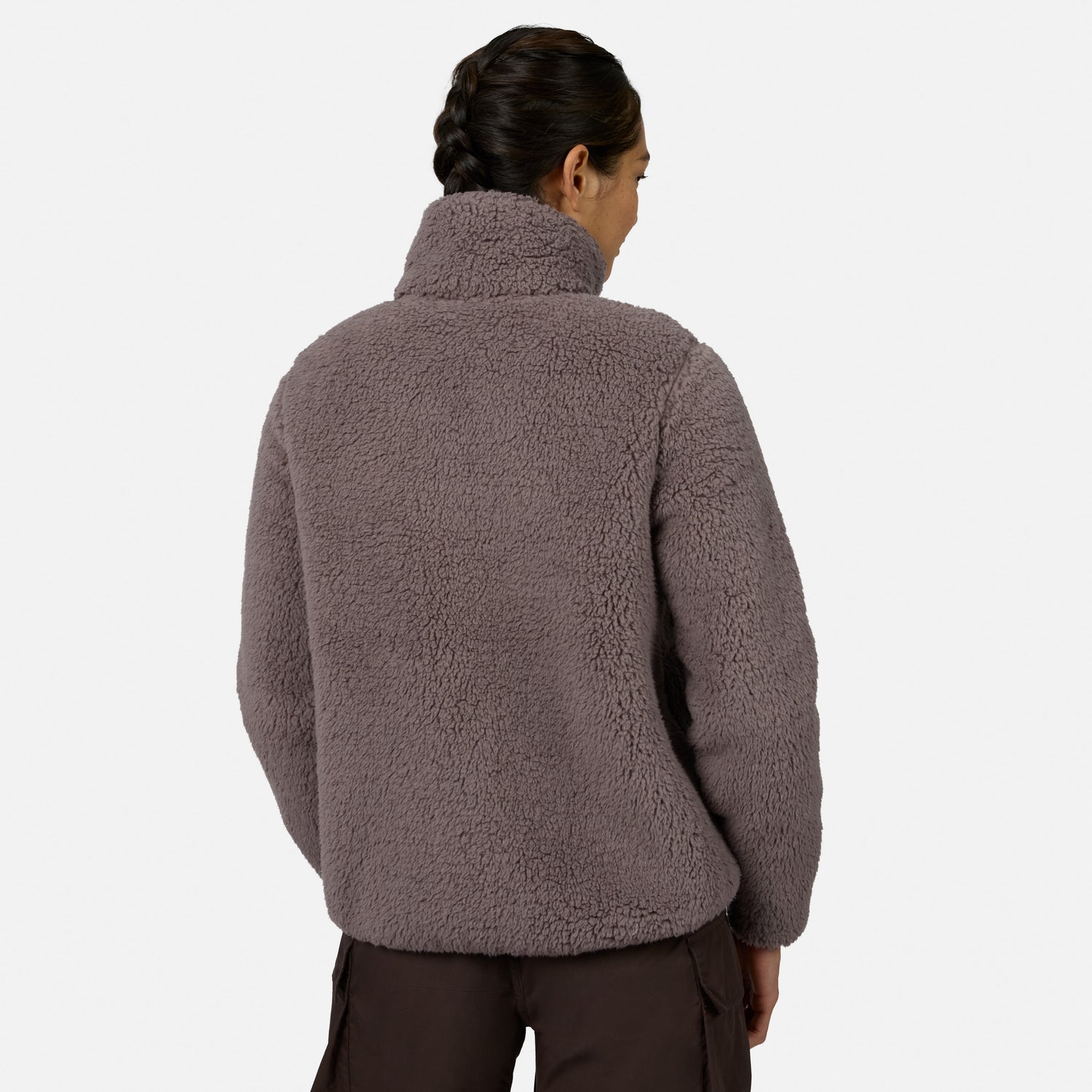 [Model is wearing size S.] A woman shown from the back wearing a textured, sherpa fleece pullover jacket in a muted taupe-brown color, paired with dark brown pants, against a plain light gray studio background.
