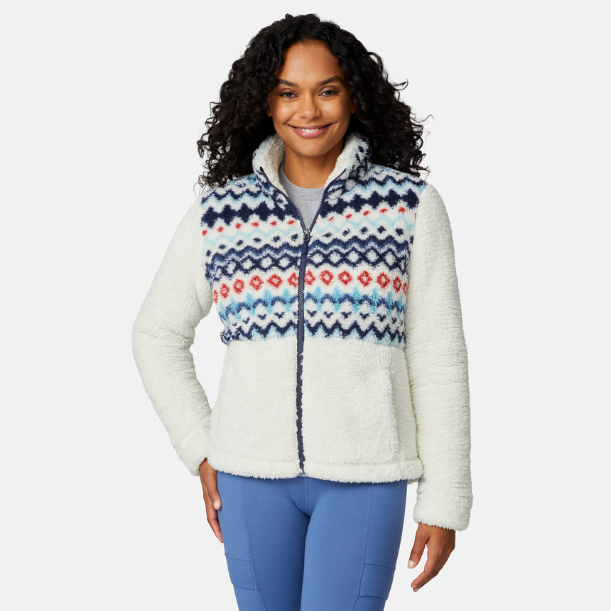 [Angelique is 5'10" wearing size S.] Woman wearing a white fleece jacket with a colorful patterned front panel on a light gray background