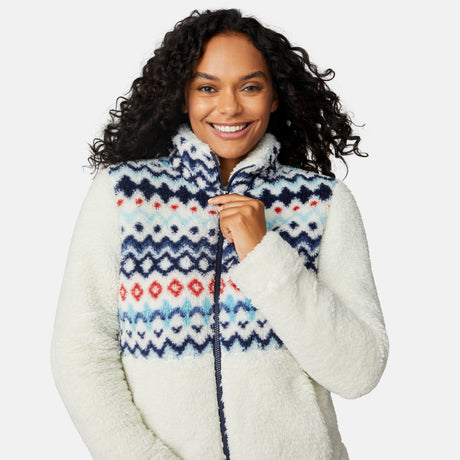 [Angelique is 5'10" wearing size S.] Woman wearing a white fleece jacket with a colorful patterned front panel on a light gray background