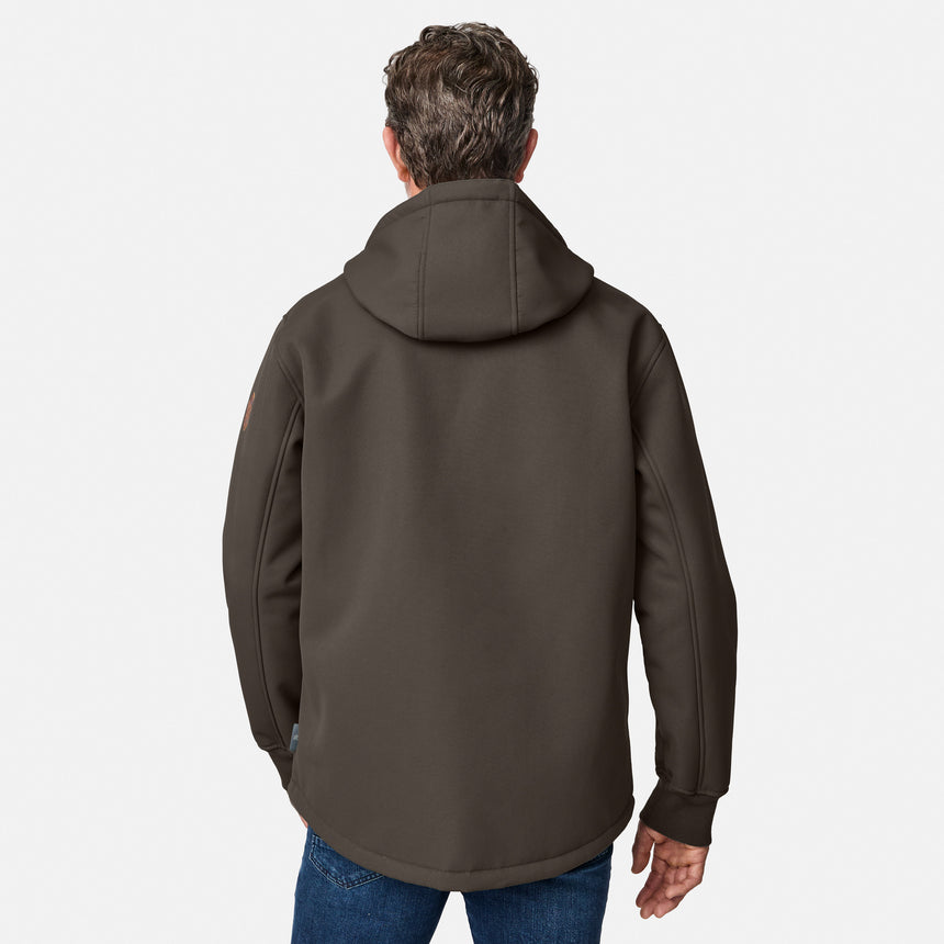 [Kolby is 6'2" wearing size M.] Men’s Free Country brown hooded jacket featuring full front zipper, two side pockets, and zippered chest pocket. Includes utility patch on left sleeve and subtle brand label at lower hem. Styled with blue jeans for a laid-back cold-weather look highlighting functional design and casual edge.