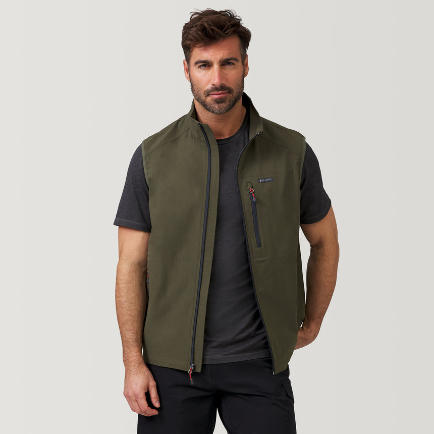 [Justin is 6’1” wearing a size Medium.] Men's Stretch Rip Stop Adventure Vest - M - Dark Olive #color_dark-olive