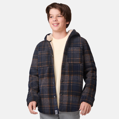 [River is wearing size M.] Boys  blue and brown plaid hooded jacket with button-front closure and dual chest pockets — warm, heavyweight layer for cold-weather wear