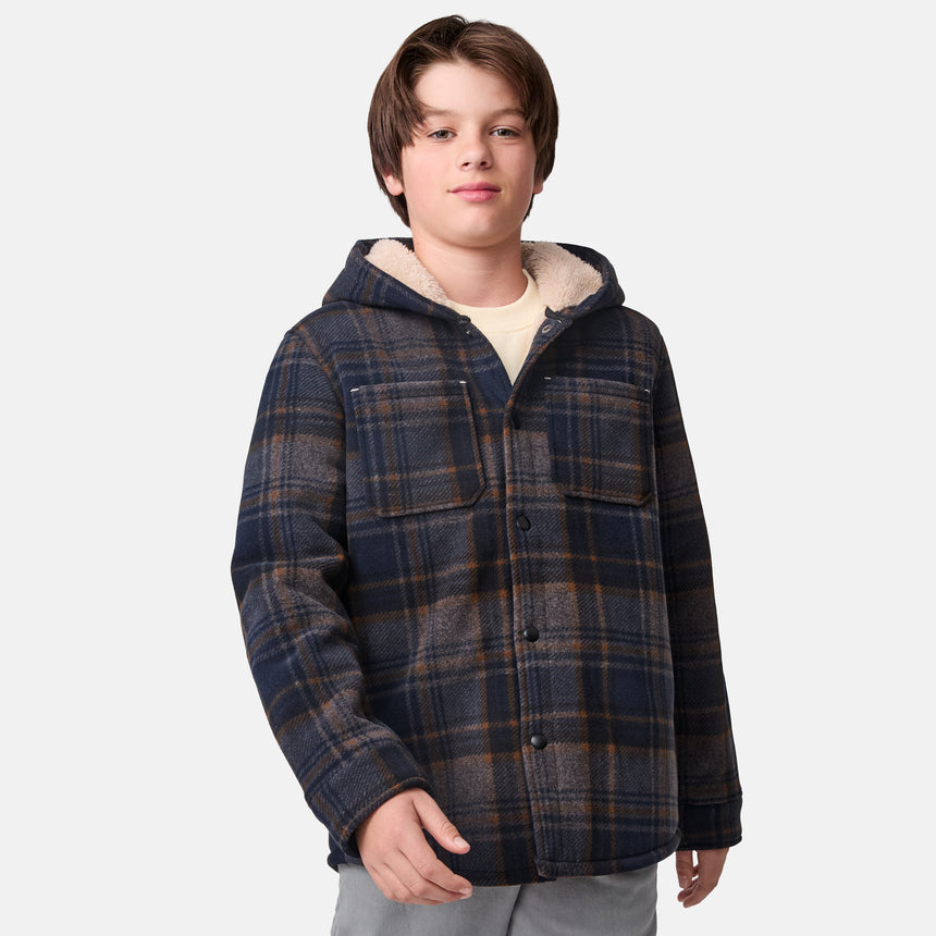 [River is wearing size M.] Boys  blue and brown plaid hooded jacket with button-front closure and dual chest pockets — warm, heavyweight layer for cold-weather wear