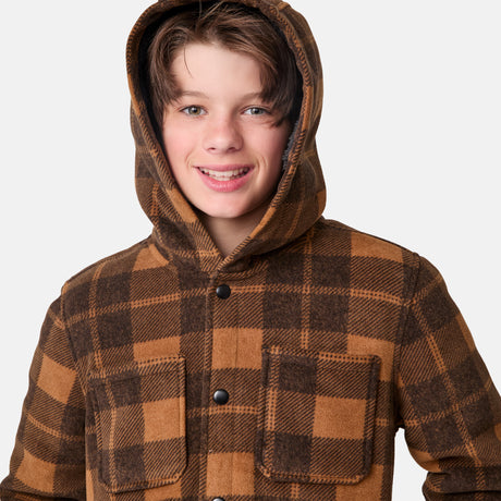 [River is wearing size M.] Close-up of brown checkered jacket with hood and chest pockets — soft brushed fabric and classic outdoor design for transitional weather